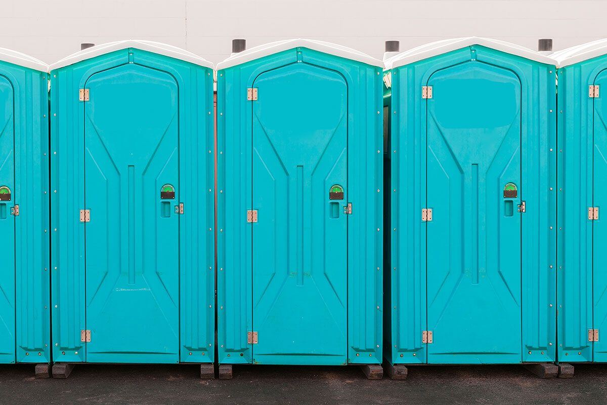 Industrial portable restroom units at a plant in Espanola, New Mexico
